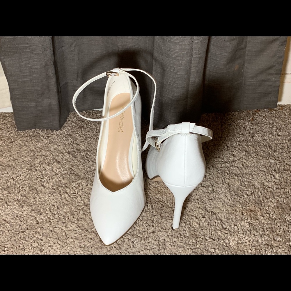 Brand new heels. Never worn/no damage